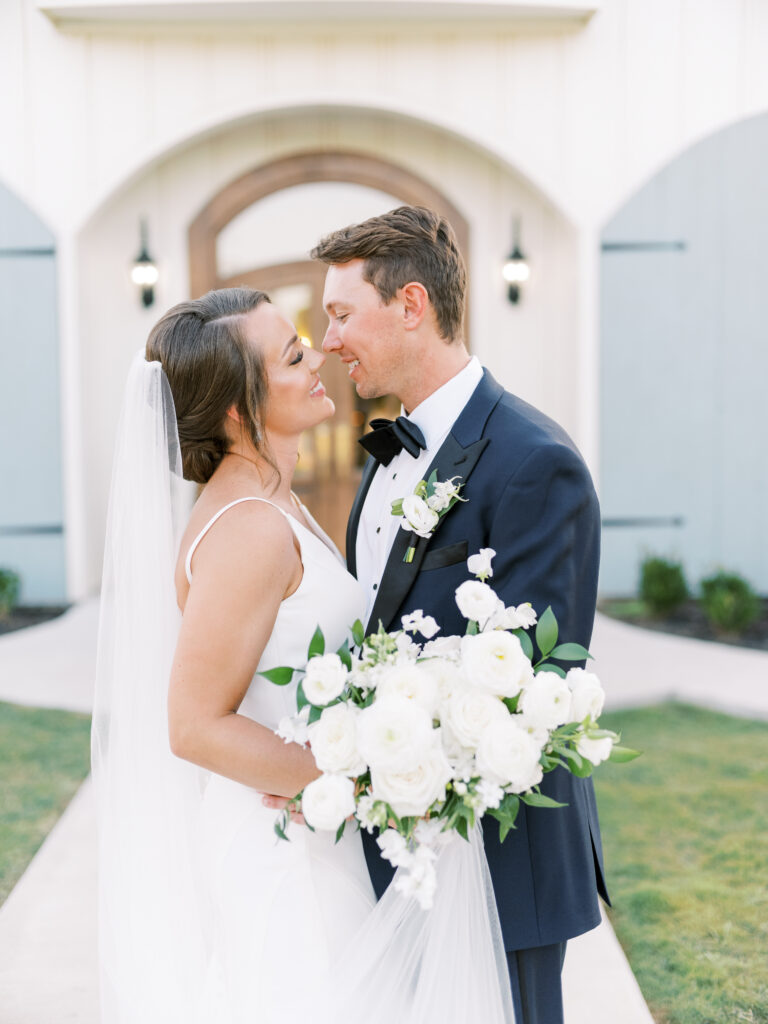 Bride & groom at wedding at The French Farmhouse Venue, photographed by Dallas Wedding Photographer, Bethany Erin Photography. 