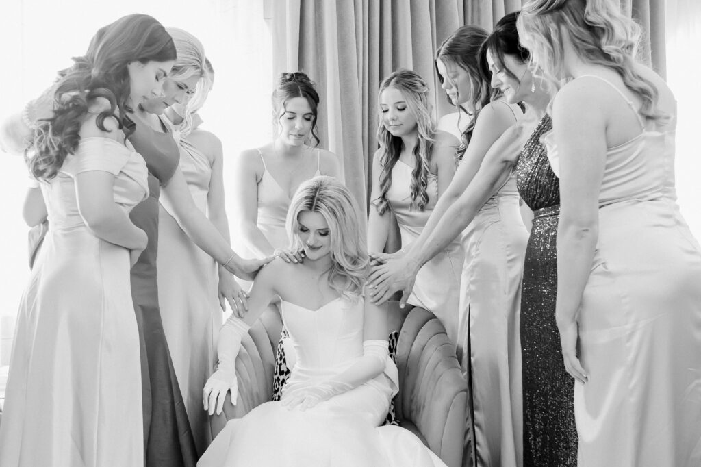 Bride and bridesmaids praying, photographed by Dallas Wedding Photographer, Bethany Erin Photography.