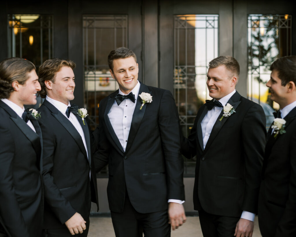 Candid groom with groomsmen photo, photographed at Hotel Vin wedding by Dallas Wedding Photographer, Bethany Erin Photography.