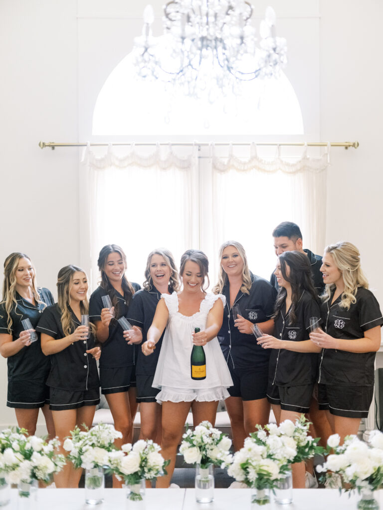 Champagne pop photographed by Dallas Wedding Photographer, Bethany Erin Photography. 