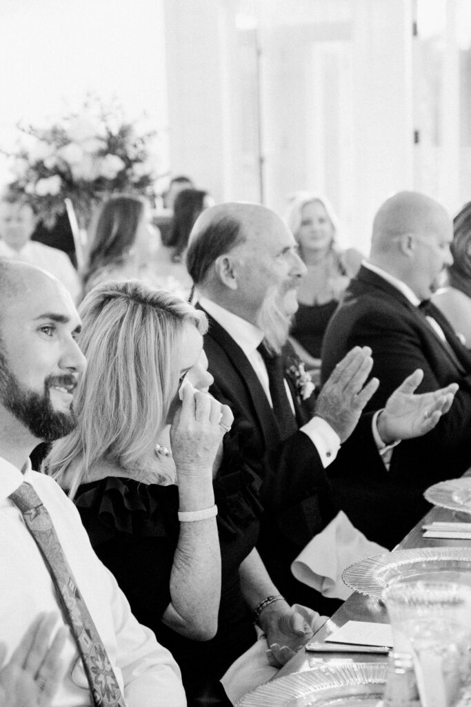 Mother of the bride wiping tears photographed by Dallas Wedding Photographer, Bethany Erin Photography. 