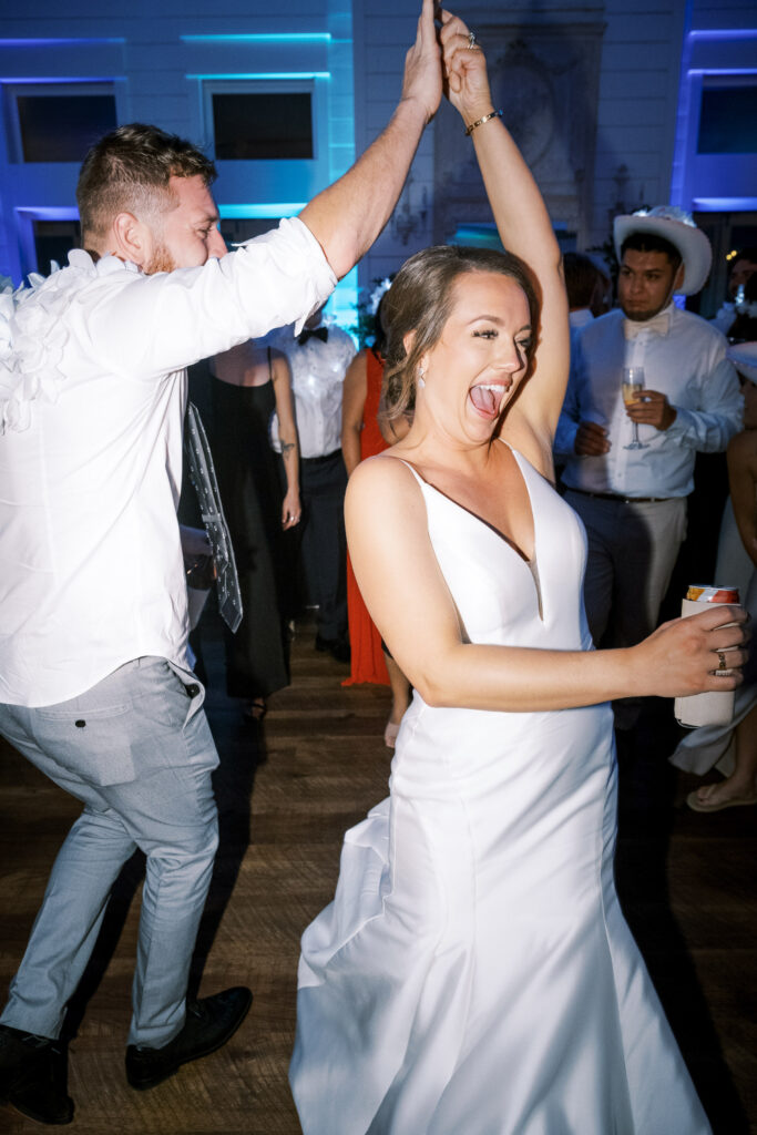 Bride dancing, photographed by Dallas Wedding Photographer, Bethany Erin Photography. 