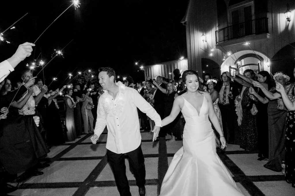 Bride & groom grand exit, photographed by Dallas Wedding Photographer, Bethany Erin Photography. 