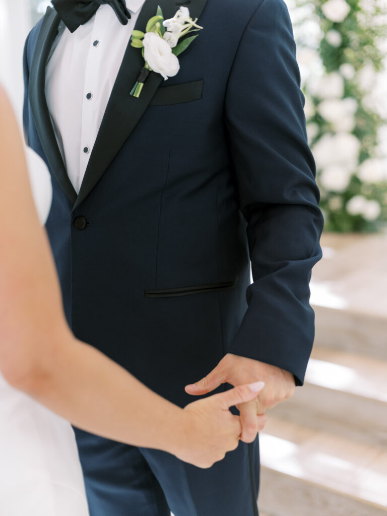 Bride & groom holding hands, photographed by Dallas Wedding Photographer, Bethany Erin Photography. 