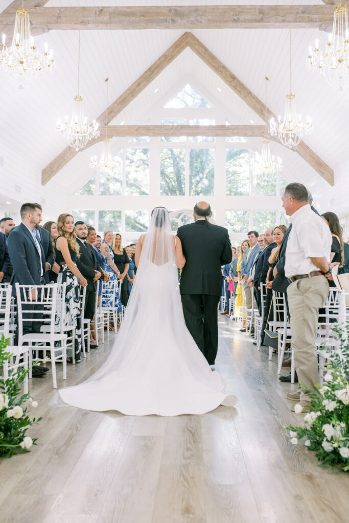 Bride and father walking down the aisle, photographed by Dallas Wedding Photographer, Bethany Erin Photography. 