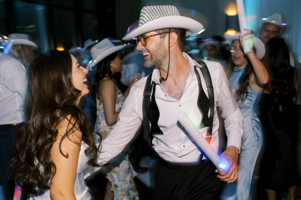 Candid bride & groom dancing photo at Hotel Swexan, photographed by Dallas Wedding Photographer, Bethany Erin Photography.