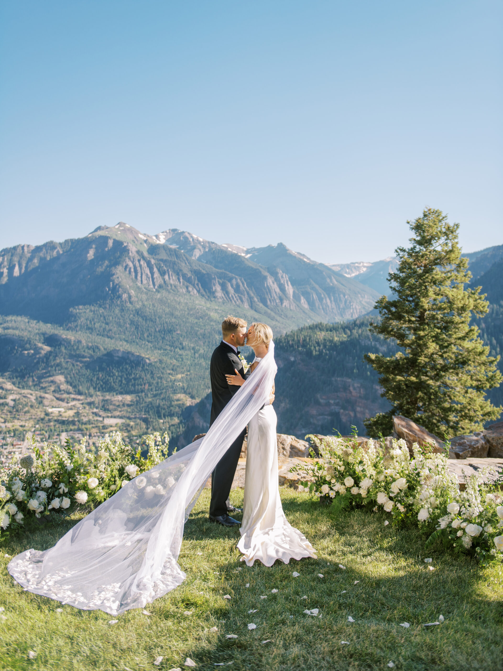 Beautiful bride and groom portrait at Gold Mountain Wedding Venue in Ouray Colorado, photographed by destination wedding photographer Bethany Erin Photography.