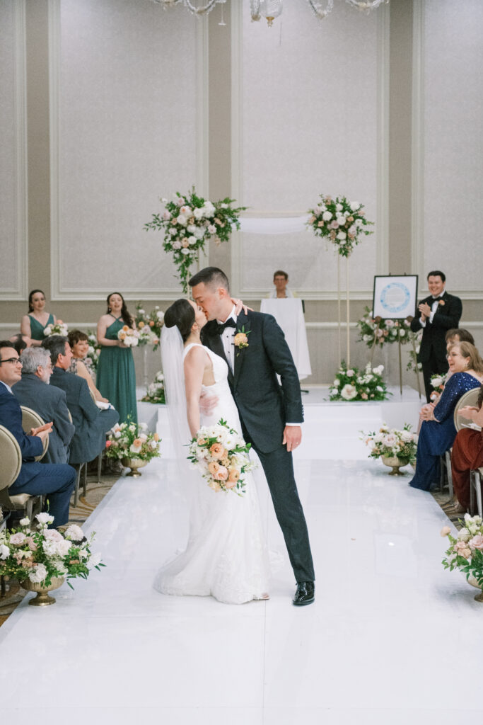 Bride and groom during wedding ceremony at The Adolphus Hotel, photographed by Dallas Wedding Photographer, Bethany Erin Photography.
