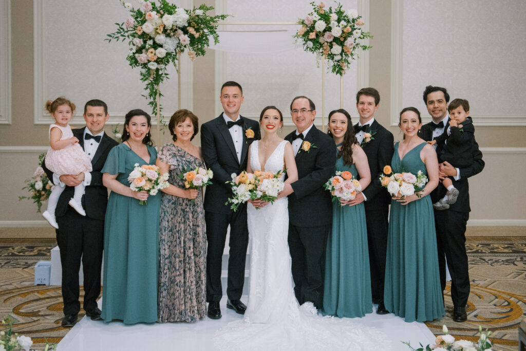 Family formal photo Bride and groom with wedding party at The Adolphus Hotel, photographed by Dallas Wedding Photographer, Bethany Erin Photography.