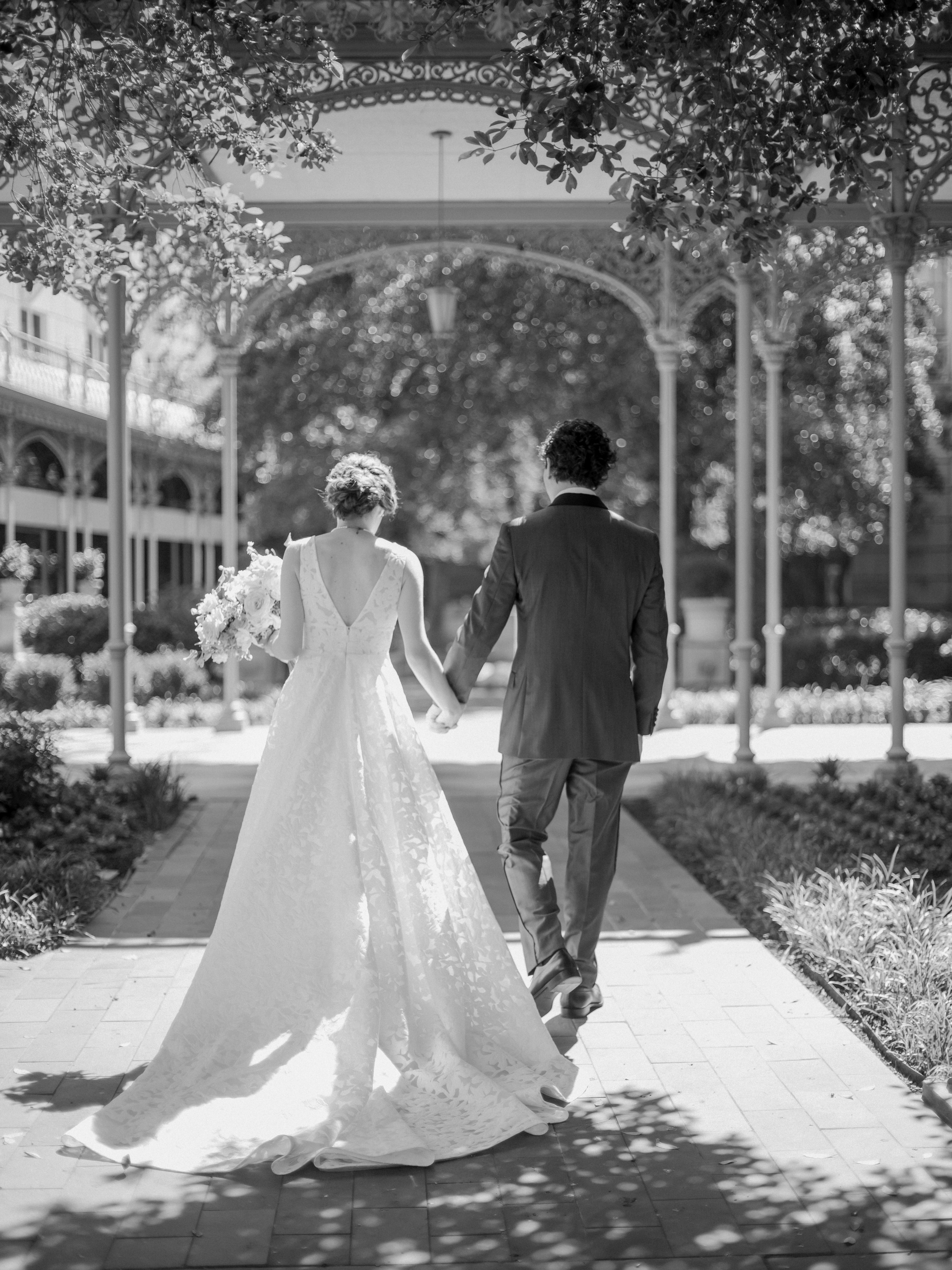 Bride and groom walking, photographed by Dallas Wedding Photographer, Bethany Erin Photography.