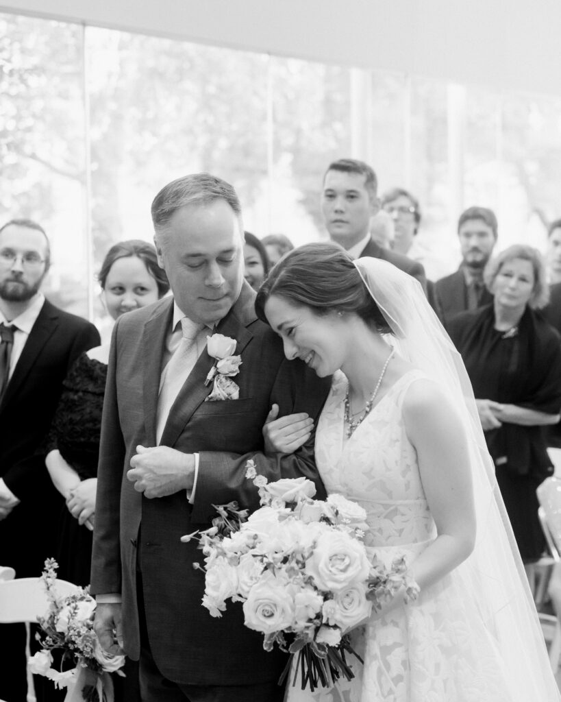 Bride and her father walking down the aisle, photographed by Dallas Wedding Photographer, Bethany Erin Photography.